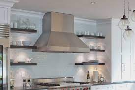 Available in wall mount, island mount and under cabinet mount styles, these range hoods will easily integrate into any kitchen with the stainless hood's unique and functional design. Floating Shelves Around Range Hood Floating Shelves Kitchen Kitchen Design Kitchen Shelf Design
