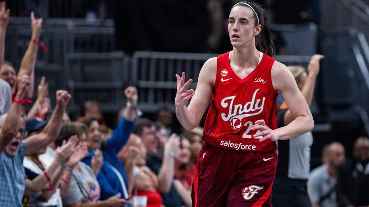 Caitlin Clark celebrating during her record-breaking 45-point performance, do AI tạo