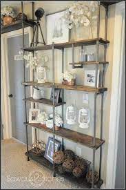 The plumbing pipe frame highlights the rugged utility that's the hallmark of the style. Pin On Home Shelving