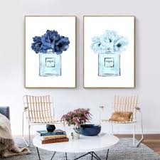 Creating a darkened environment with blue lighting makes attendees concentrate and engage more with content in a cinematic experience. Modern Fashion Perfume Poster Blue Watercolor Peonies Floral Painting Canvas Prints Woman Makeup Wall Pictures Girls Room Decor Nordic Wall Decor