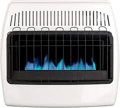 These heaters work much the same way that a gas hot water heater does, with a pilot light that burns constantly and ignites the burner when the temperature falls below a certain point. Amazon Com Dyna Glo 30 000 Btu Natural Gas Blue Flame Vent Free Wall Heater White Home Kitchen