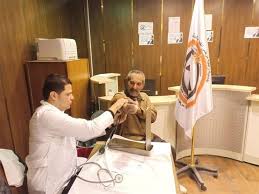 تحد غير مسبوق للرئيس التركي داوود أوغلو يتحدث عن يأس واسع في حزب أردوغان Lab Coat Coat Jackets