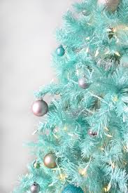 This was a cardboard tree i got in the christmas craft section at hobby lobby. Diy Mint Green Christmas Tree Spray Painted Tree A Joyful Riot