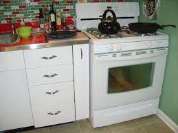 Maybe you would like to learn more about one of these? The Seven Month Saga Of Susan S Steel Kitchen And Her Tip On A Metal Cabinet Refinisher In New Jersey Retro Renovation