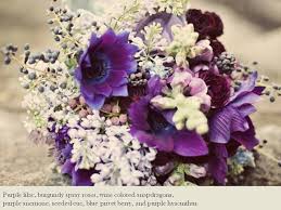 If purple is what you've decided on, you're in luck: Deep Purple Blue And Ivory Statement Bridal Bouquet