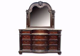 Selecting the right bedroom piece can increase a bedroom's storage space while also adding a touch of style. Stanley Dresser With Mirror Dark Brown Home Furniture Plus Bedding
