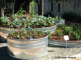 Check spelling or type a new query. Stock Tank Planters Gone Wild Digging