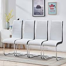 If you want contemporary glamor, coordinate metallic modern dining chairs with the chandelier for an overall chic effect. Modern Dining Chairs Set Of 4 White Black Side Dining Room Chairs Kitchen Chairs With Faux Leather Padded Seat High Back And Sturdy Chrome Legs Chairs For Dining Room Kitchen Living Room