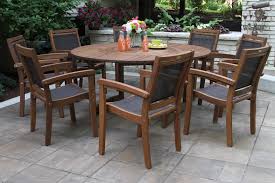 These sets include a dining table and two or more dining chairs , and can range in size from small bistro sets to large sets, with enough space to host ten or more guests. Large Round Eucalyptus Wood 63 Lazy Susan Dining Table
