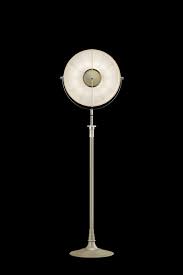 Woman before a glass every plain woman who looks into a mirror yearns to see a pretty woman. Atelier 41 Quartz White Floor Lamp Fortuny