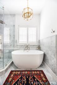 Obviously, if you have a larger bathroom this won't be as much as a problem, but if your bathroom is on the smaller side of things this will be something you'll have. Marble Bathroom Master Bath Reveal Maison De Pax