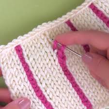 Weave in the ends of the yarn once you've finished all your stripes, thread a dangling piece of yarn into your darning needle and weave in all the ends. Easily Knit Vertical Stripes Using A Crochet Chain Studio Knit
