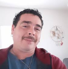 What are the loud booms and helicopter noises in East Moriches?