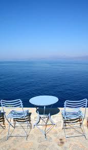 Blue Chairs Facing Blue Water And Sky On The Island Of Hydra Greece Greece Holiday Greece Greece Travel