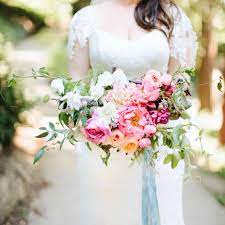 Complement a romantic, monochromatic wedding ensemble with a bouquet of fluffy white peonies, like this bride did thanks to a adornments' arrangement. 40 Perfect Peony Wedding Bouquets