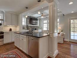 This kitchen island with table extension has been designed to include a breakfast area. 3527 Runnymede Pl Nw Washington Dc 20015 4 Beds 3 5 Baths Kitchen Columns Luxury Kitchen Design White Kitchen Remodeling
