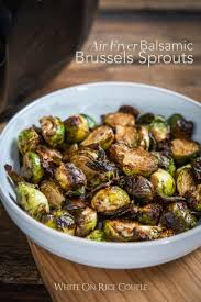 Brussels sprouts fried crisp and glazed with sweet honey, citrus flavors, and fiery sriracha. Air Fryer Brussels Sprouts With Balsamic Vinegar Crispy White On Rice