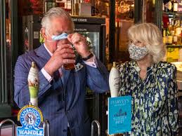 Prince Charles sips his first beer at ...