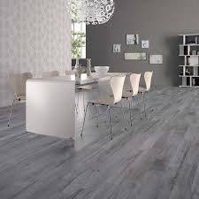 Modern Dining Area With Tiles From Soleras Collection By Abk Gray Wood Tile Flooring House Flooring Wall And Floor Tiles