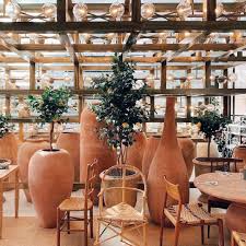 The New Citronparis Cafe By Jacquemus And Caviarkaspia Is Fueling Our Love For Oversized Terra Cotta Everythin Jacquemus Restaurant Design Greek Restaurants