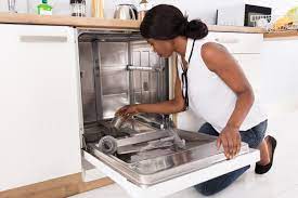 Place a container with white vinegar on the top rack. How To Clean A Dishwasher