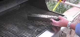 What does gas do grills use? How To Use A Smoker Box Kitchen Utensils Equipment Wonderhowto