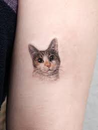 If you have your own cat tattoos, post them here or vote on the classiest cat tattoos below! 40 Small Cat Tattoos That Are Absolutely Adorable