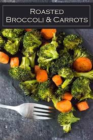 Roasted Broccoli And Carrots Recipe Sidedish Vegan Vegetarian Vegetables Easy Carro Roasted Broccoli And Carrots Carrots Recipe Healthy Carrots Side Dish