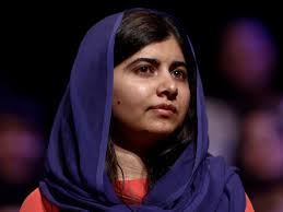 She sports subtle makeup with a red lip shade and a ring by alice cicolini. Everything We Learnt About Malala From Her Vogue Interview The Independent