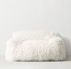 This bean bag is produced with a 100% super cozy faux sheepskin sherpa zippered slipcover, which is so soft your kid will not mind reading for a few extra minutes every day. White Faux Fur Foam And Bead Chair