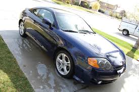 Image result for Carbon Blue 2003 Tiburon