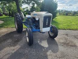 Image result for Blue 1963 Tractor