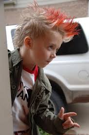 Find out the latest and trendy boys and girls hairstyles and the topic of hairstyles for kids is particularly interesting to every mom who has been blessed with a daughter. A Fun Red Tipped Mohawk For A Great Rock Star Look Even At 5 He Pulls It Off Rock Star Hair Cute Boy Hairstyles Boy Hairstyles