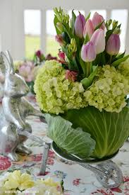 At The Table Farmer Bunny A Blooming Cabbage And Hilltop Garden Friends Spring Easter Decor Easter Centerpieces Easter Flowers
