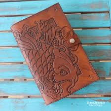 Sunflower template leather working patterns leather crafting leather pattern leather tooling artsy fartsy irish steampunk moose art. Leather Tooled Book Cover With Koi And Hibiscus