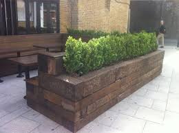 Picture of the lutyens garden bench in a catalog. Exterior Seating International Visual