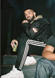 Drake Looking All Sporty With Some Adidas Trousers And Yeezy Shoes Drake Wallpapers Drake Photos Aubrey Drake