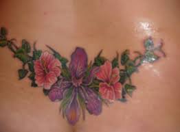 Sleeve flower tattoos for girls. 15 Beautiful Lower Back Tattoo Designs And Names