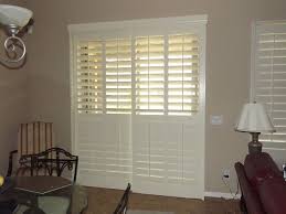 Vinyl shutters add instant value to your home. Plantation Shutters On Sliding Glass Doors Traditional Living Room Phoenix By The Louver Shop Houzz