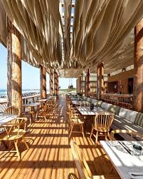 Situe Sur Une Plage Dans Le Sud Ouest Du Peloponnese Le Restaurant Barbouni Costanavarino Est Enti Design Bar Restaurant Restaurant En Plein Air Hotel Design