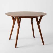 Campaign dining table the bold, turned legs of this mahogany early to mid 20th century. Mid Century Round Dining Table