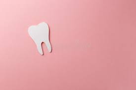 We are a team of dental professionals located in dallas, and our mission is to provide a trustworthy and comfortable dental home for you and your family. White Tooth On Pink Background Stock Image Image Of Dental Laboratory 145878795