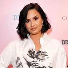 Because massive hoops are specifically not cancelled. Demi Lovato To Return To Music With 2020 Grammys Performance