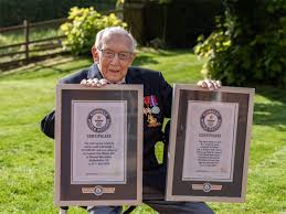 Walking 100 lengths of his garden. Britain S Captain Tom Moore Makes World Record For Most Money Raised By An Individual Through A Charity Walk The Economic Times