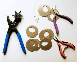 You will need some leather, cardboard, scissors, earring hooks, and a hole puncher to make attractive leather earrings. How To Make Your Own Leather Earrings Without A Cutting Machine Melissa Voigt