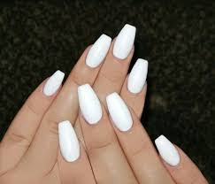 The perfectly manicured nails look extremely pretty with little details on them. 50 Romantic And Stylish White Nail Designs And Ideas For This Fall Nails White Acrylic Nails Trendy Nails Short Acrylic Nails