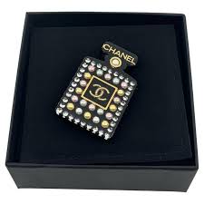 CHANEL Black and Gold CC Logo Perfume Bottle Brooch For Sale at 1stDibs