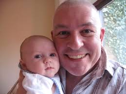 Man's battle to hold his newborn son after cancer surgery left him too weak 