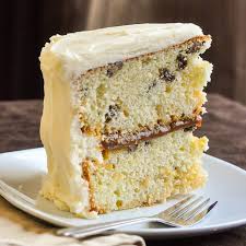 With a buttery rum glaze, this rum cake from delish.com is guaranteed to be your dessert centerpiece. Rum Raisin Cake Or Frosted Rum Raisin Caramel Cake A Boozy Taste Of The Caribbean Recipe Rum And Raisin Cake Raisin Cake Raisin Recipes