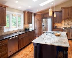The wood paneling and integrated sink and countertop are two design highlights from this kitchen. Modern Kitchen Cabinets Best Ideas For 2017 Home Art Tile
